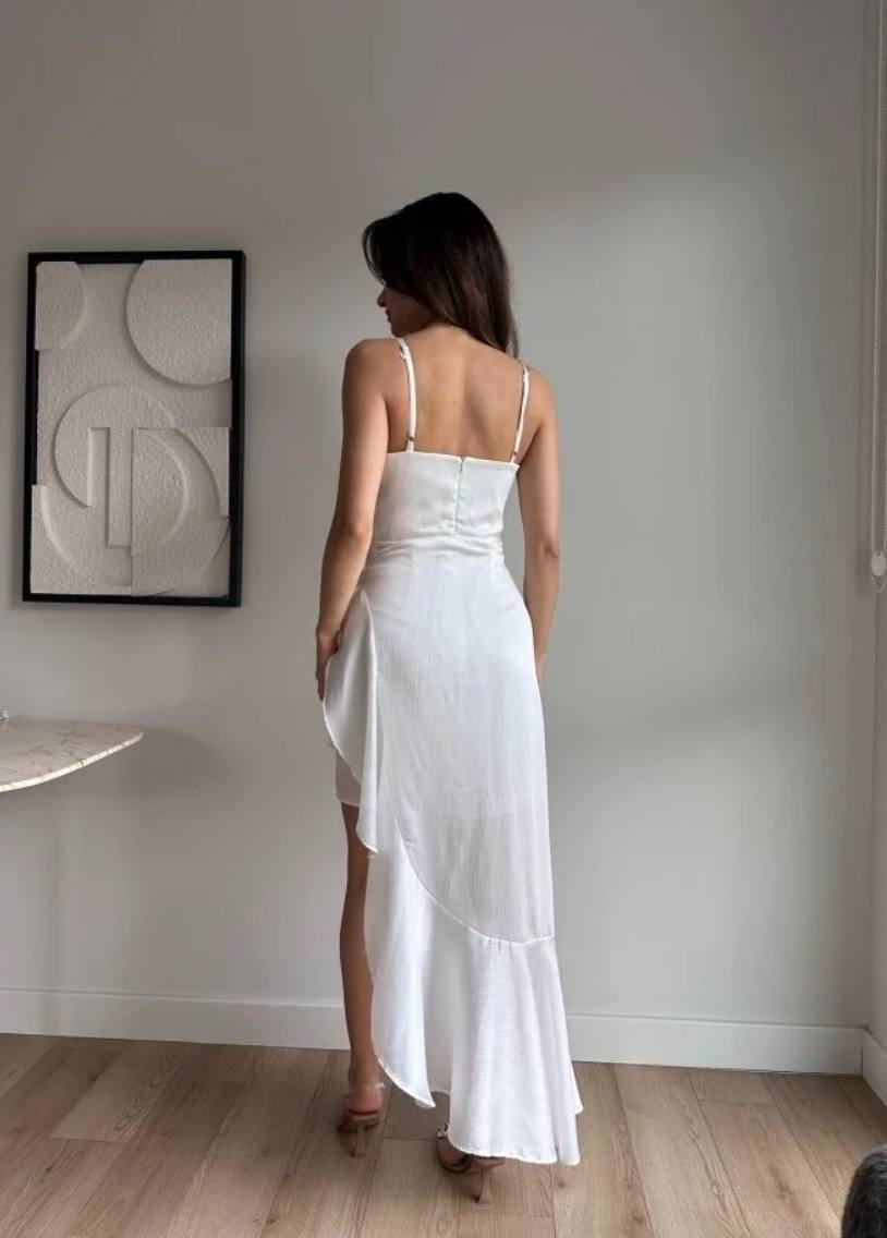 Bijela elegantna midi haljina s asimetričnim volanom