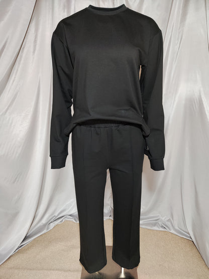 Crna trenirka s patentnim zatvaračem sa strane