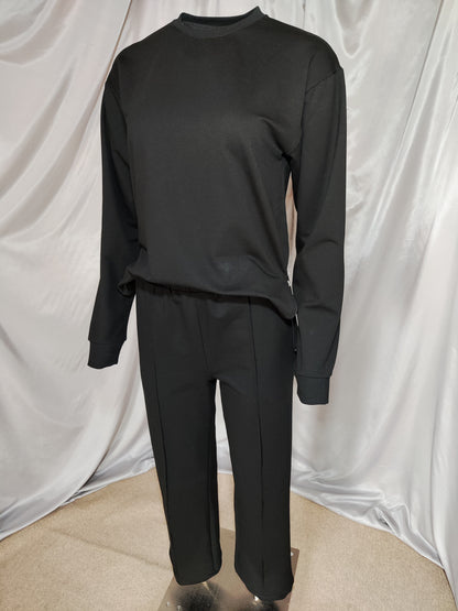 Crna trenirka s patentnim zatvaračem sa strane