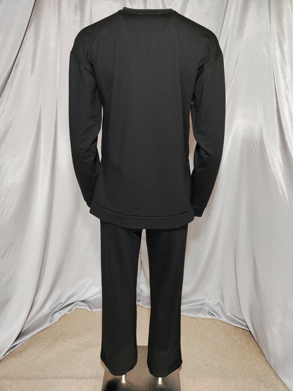 Crna trenirka s patentnim zatvaračem sa strane