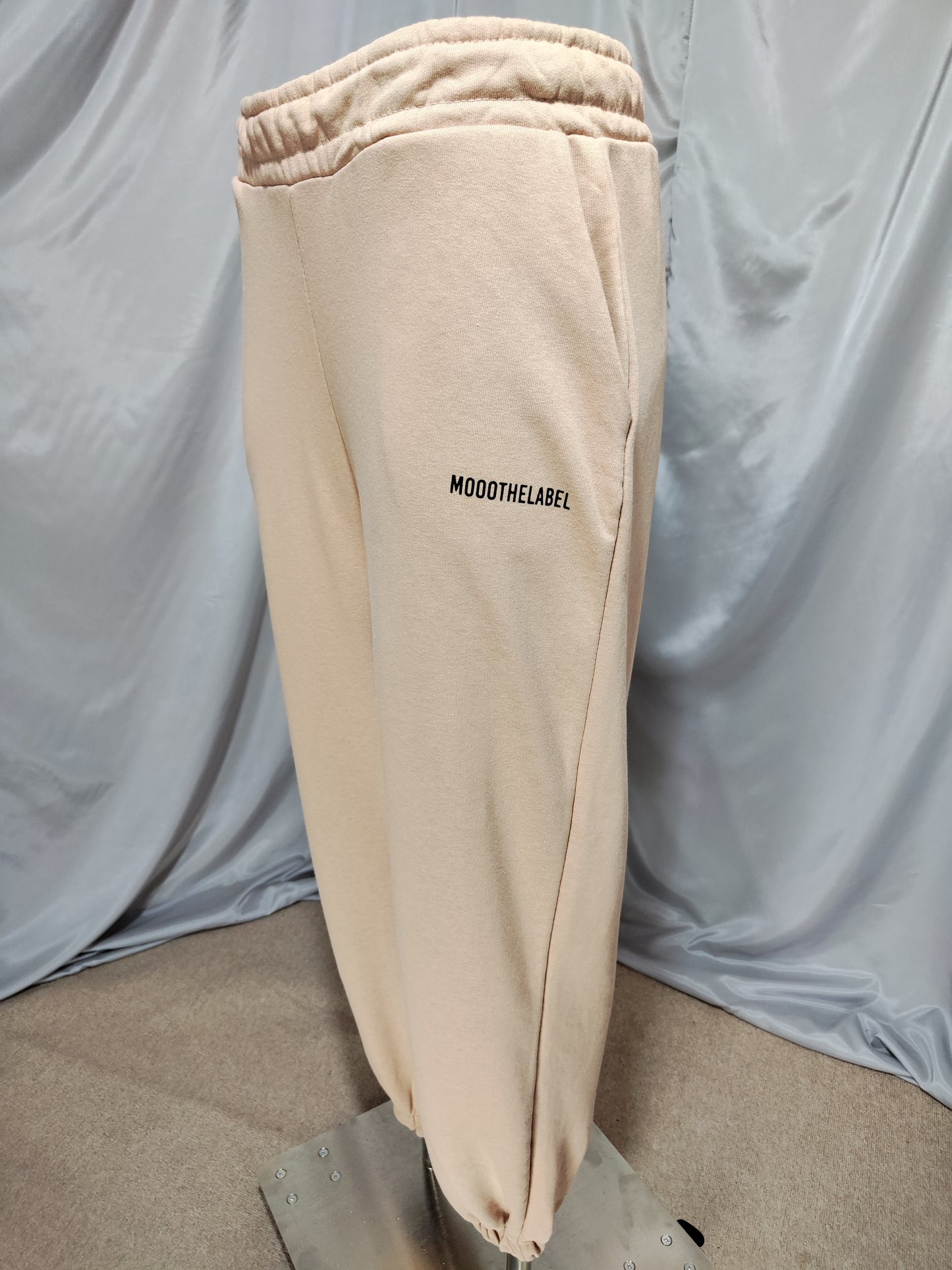 Bež trenirka s patentnim zatvaračem