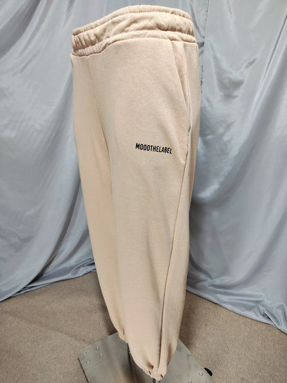 Bež trenirka s patentnim zatvaračem